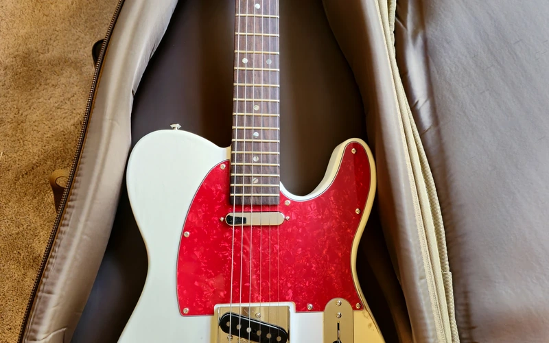 Finished Telecaster-style guitar in a case