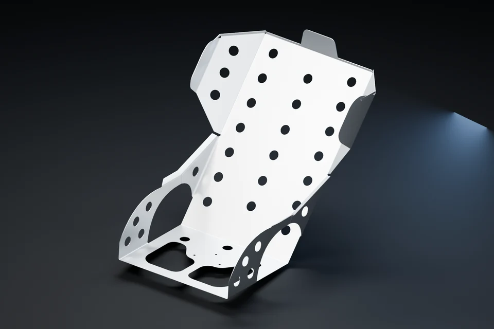 Folded and perforated aluminum driver seat.