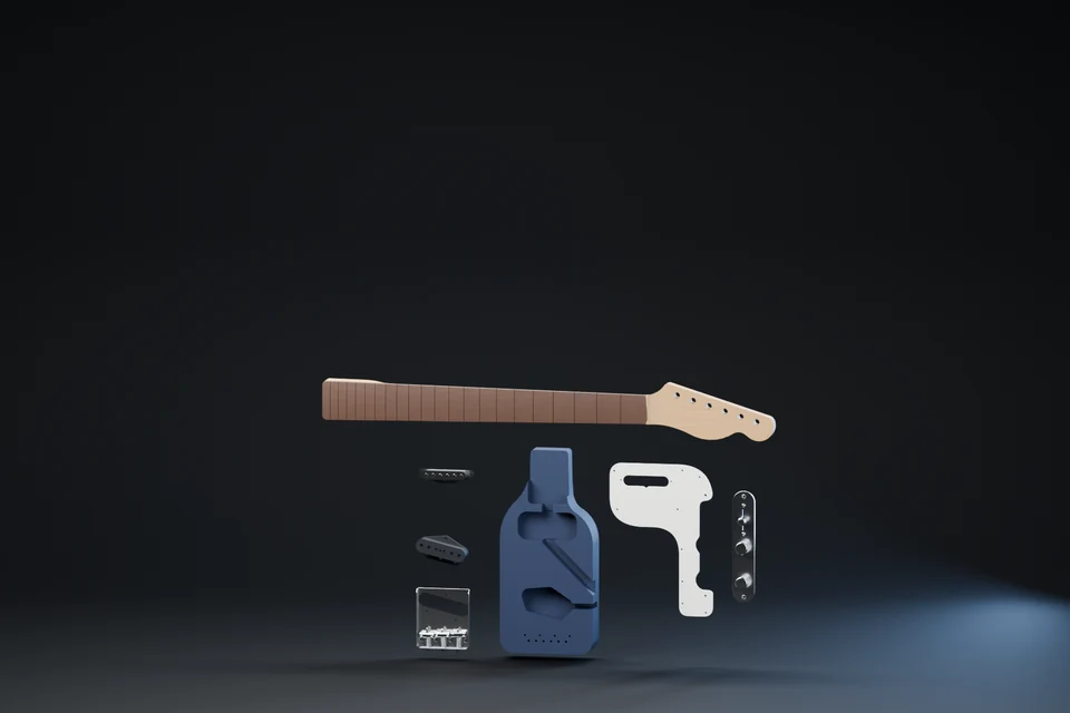 Separated guitar education kit before assembly.