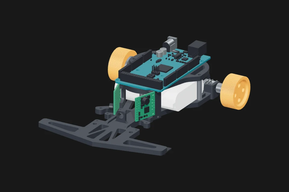 Line-following robot with orange wheels and a teal circuit board.