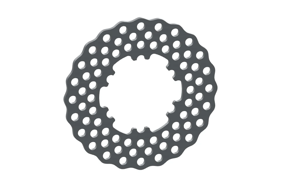 Perforated cast-iron brake rotor before heating.
