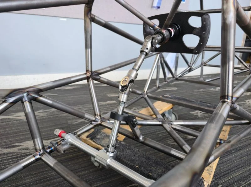 Formula SAE steering linkage mounted in the chassis
